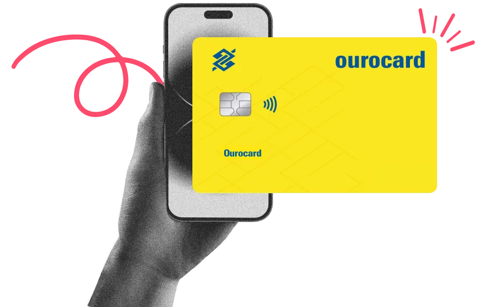 Mão segurando celular exibindo cartão Ourocard